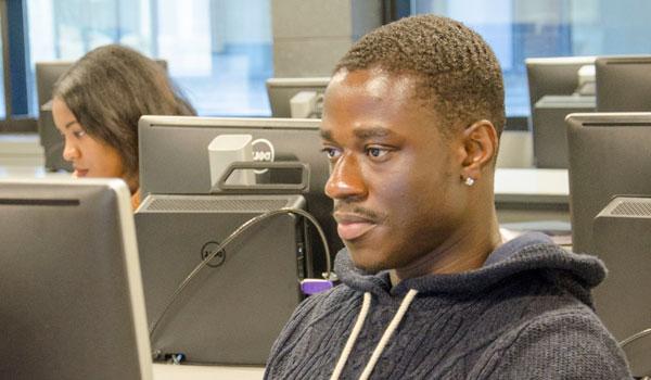 student at a computer